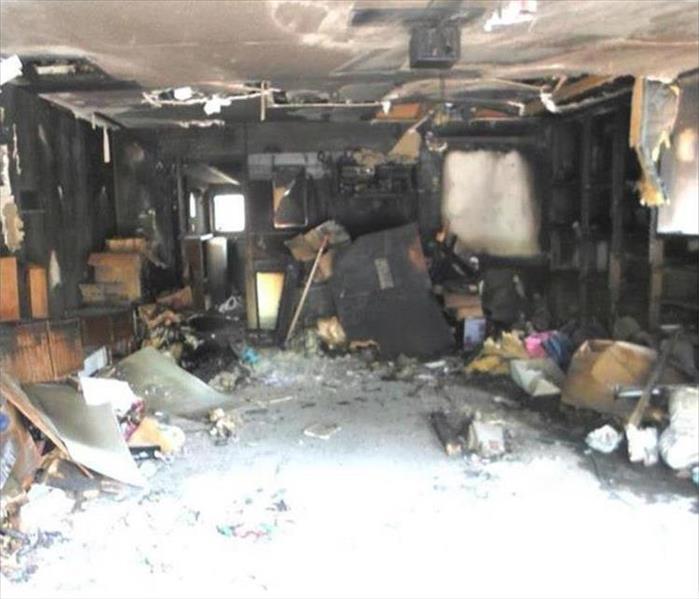 fire damage garage, charred elements and ceiling