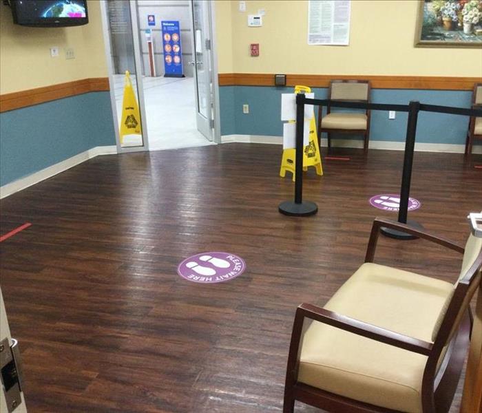 wood floor waiting room, yellow cones